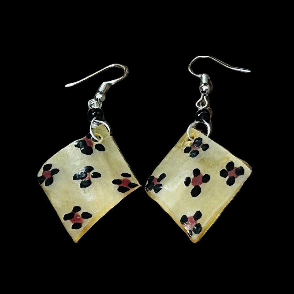 Handcrafted horn earrings, made in Africa. Benefits charity.